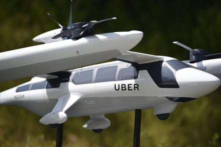 A model of Uber’s electric vertical take-off and landing vehicle (eVTOL) concept flying taxi.
