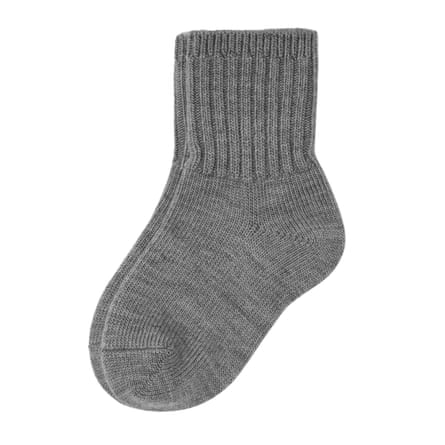 A grey ribbed-cuff merino wool sock lies against a white background
