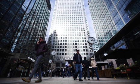 International banks tower over pedestrians at Canary Wharf, London