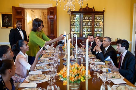 Michelle Obama lights candles during a Seder at the White House in 2012.