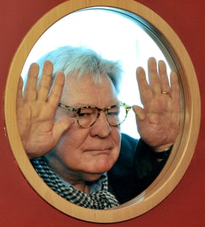 Alan ParkerBritish film director Alan Parker looks through a cinema door window prior to meeting the media in Prague Friday, March 28, 2008. Parker received the Kristian prize for his contribution to world cinematography, at the opening ceremony of the 15th Febiofest international film festival