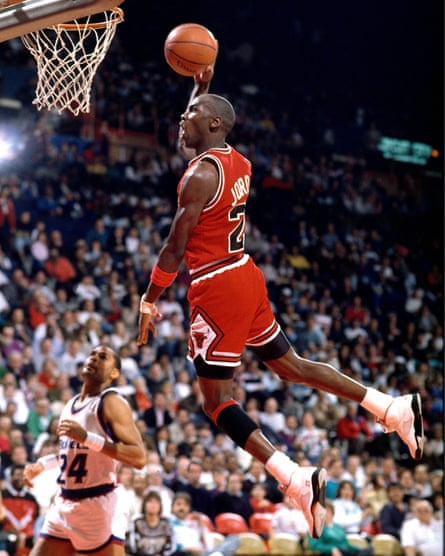 Michael Jordan scores a basket