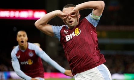 John McGinn celebrates scoring in the Premier League match between Aston Villa and Arsenal