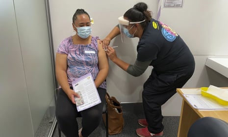 Denise Fogasavaii receives a dose of the Pfizer Covid-19 vaccine in Auckland. New Zealand has opened its first large vaccination clinic as it scales up efforts to protect people from the coronavirus.