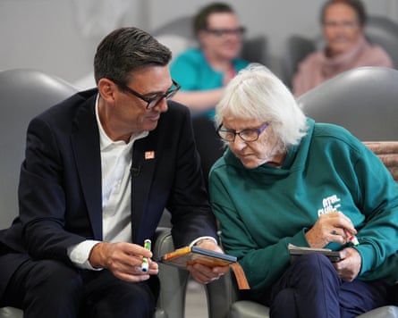 Andy Burnham plays bingo during a visit to Humphrey Booth resource centre in Salford, 9 October 2026.
