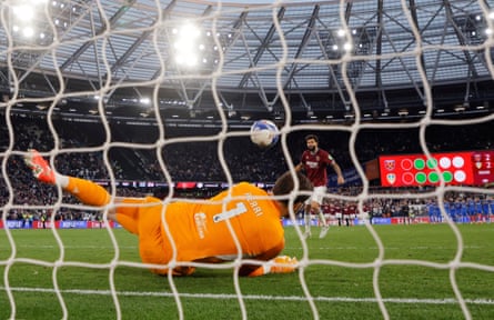 Lucas Perri the Leeds goalkeeper makes a crucial save from Pablo of West Ham in the penalty shootout