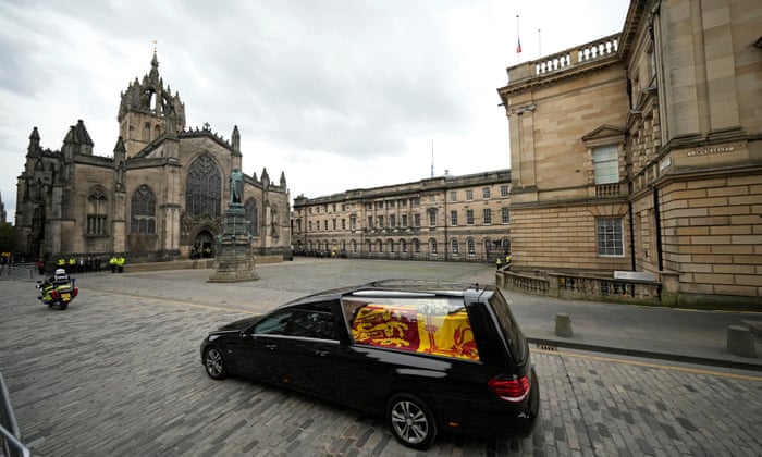 The cortege carrying the coffin of the late Queen Elizabeth II passes St Giles' Cathedral on its way to Palace of Holyroodhouse