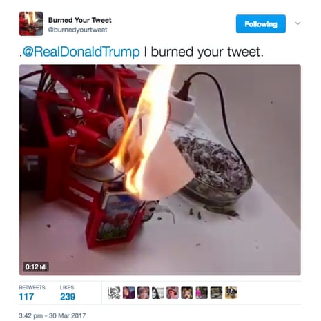 A robot prints out and burns Donald Trump’s tweets.