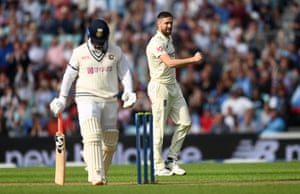 Chris Woakes sees off Rishabh Pant.