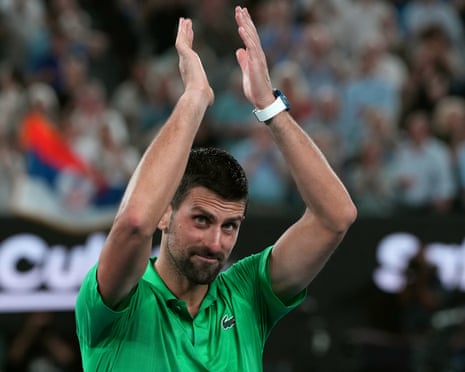 Novak Djokovic celebrates after defeating Jannik Sinner in the Australian Open semi-final.