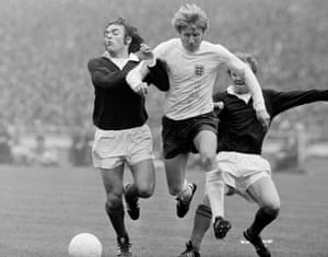 England’s Colin Bell (centre) surges through challenges by Scotland’s Lou Macari (left) and Billy Bremner during their British Championship International match at Wembley Stadium in May 1973 which England won 1-0. Bell earned 48 caps between 1968 and 1975,