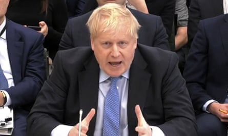 Boris Johnson astatine  a proceeding  of the parliamentary privileges committee.