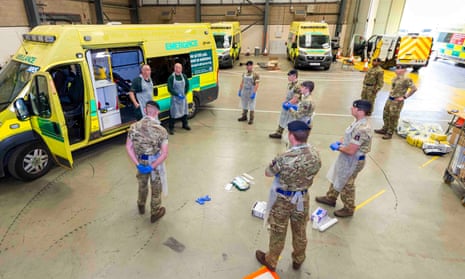 NHS paramedics training soldiers on the use of ambulances and PPE at the Wattisham Flying Station in Suffolk, 17 April 2020