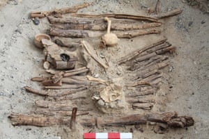 A photo of a brazier and skeleton found in one of the tombs during excavations.