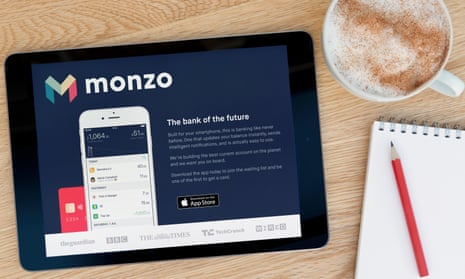 Someone looks at the Monzo website on a tablet