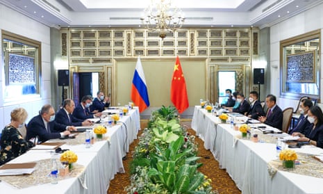 Russian Foreign Minister Sergei Lavrov meets with his Chinese counterpart Wang Yi in Denpasar.