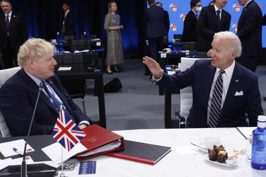 Boris Johnson with Joe Biden (right) at the Nato summit in Madrid this morning.