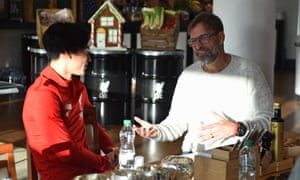 Takumi Minamino has a chat with Jürgen Klopp on his first day at Liverpool’s training ground.
