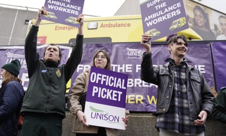 Ambulance workers on the picket line outside Waterloo ambulance station in London on 21 December.