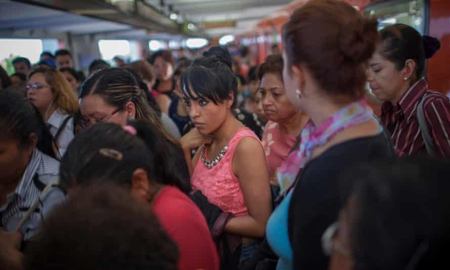 A crowd of commuters moves toward a staircase after exiting the subway at the Pantitlan Metro station in Mexico City. The Mexican capital has the second-largest metro system in North America after New York.