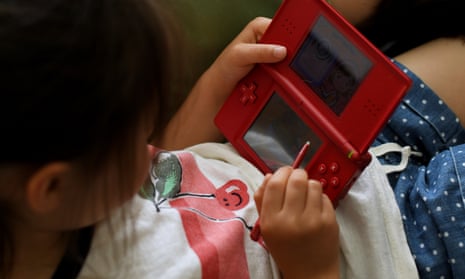 The Nintendo DS with stylus.