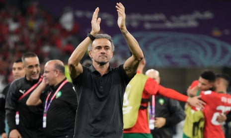 Luis Enrique applauds the fans after Spain lost to Morocco on penalties