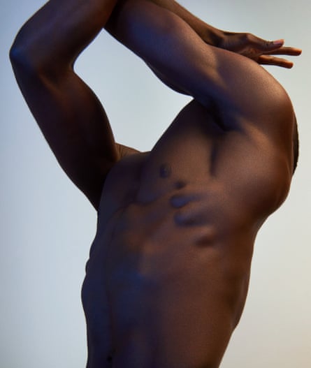 A muscular black man’s torso