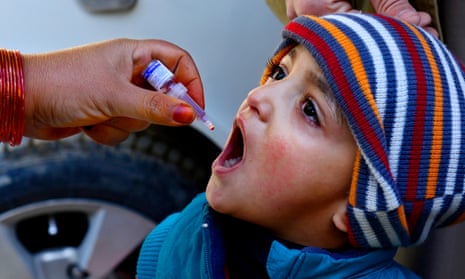 A child in Quetta, Pakistan, receives a polio vaccination