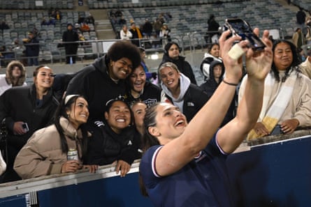 Ilona Maher poses for photographs pinch fans aft nan Pacific Four Test Series lucifer betwixt Australia and USA successful Canberra successful May