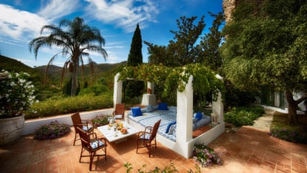 The property offers shaded terraces, daybeds and alfresco dining
