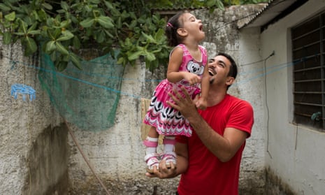 A father whose daughter was born with microcephaly in Recife