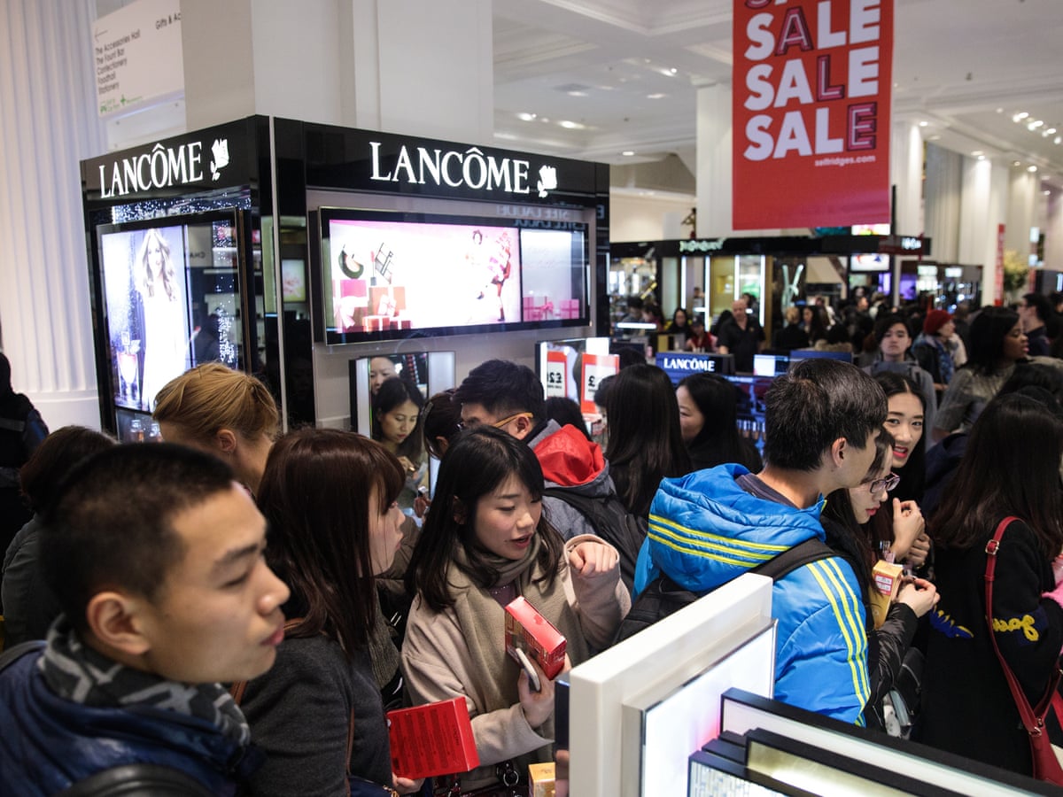 Uk Shoppers Head Out In Their Millions To Brave Boxing Day Sales Business The Guardian