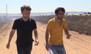 Alexey Nikitin (left) and Zakir Ismailov at a brick factory in Dagestan