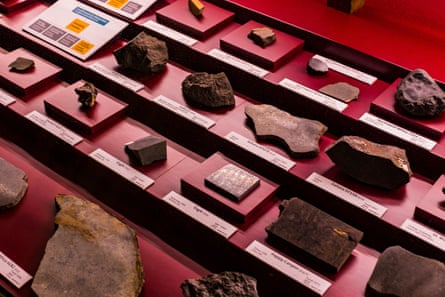 Meteorite fragments individually labelled on an exhibition table