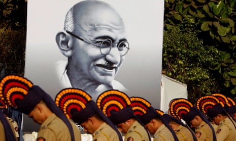 Police personnel pay homage to Mahatma Gandhi near Mumbai