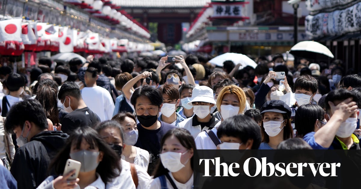 ‘We have to be careful’: why are masks still worn in Japan and South Korea?