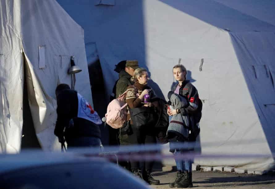 Evacuees from Azovstal steel plant arrive at a temporary accommodation centre in Bezimenne, eastern Ukraine.