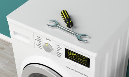 Spanner and screw on top of washing machine