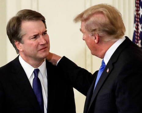 President Donald Trump greets Brett Kavanaugh.