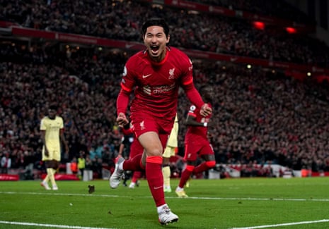 Liverpool’s Takumi Minamino celebrates after scoring their fourth goal.