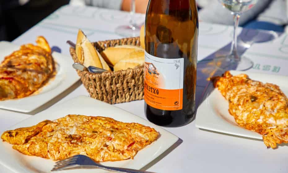Cod omelette and Txakoli, a sharp, deliciously spritzy Basque country white that typifies the variety in Europe’s wines.