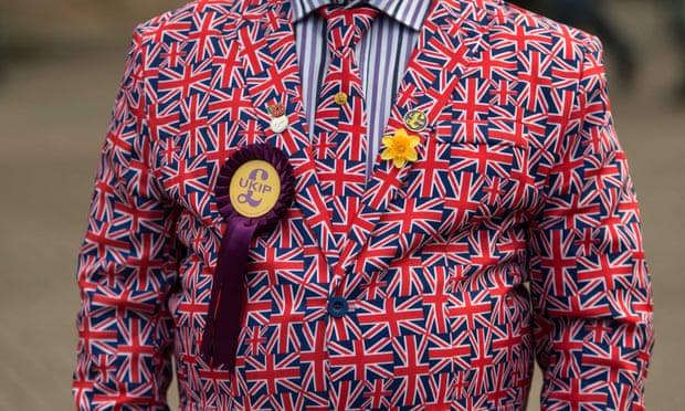 Man dressed in jacket with union flags and Ukip rosette
