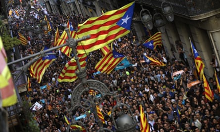 Pro-independence supporters flood streets near the Palau Generalitat in Barcelona.