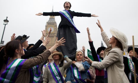 Activists dressed as suffragettes protest in Parliament Square, 2012.