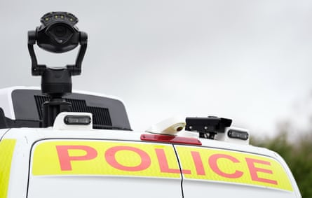 Closeup of facial recognition camera mounted on top of a police van