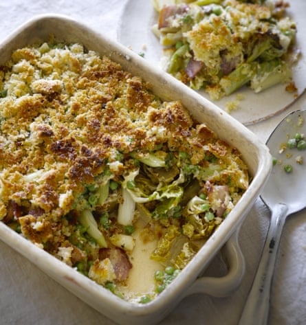 A white baking dish of lettuce gratin and a portion served on a plate