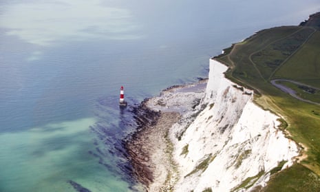 The South Downs and Beachy Head, lighthouse and Seven Sisters cliffs, Eastbourne, UK. The rate off cliff erosion has been much higher over the past 150 years, the study showed.