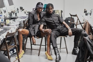 Milan, Italy: actor Rickey Thompson (L) poses with a model backstage at the Tokyo James fashion show during Milan fashion week showcasing womenswear for spring/summer 2023