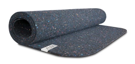 a rolled up speckled mat