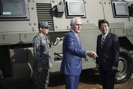 Malcolm Turnbull with his Japanese counterpart Shinzo Abe at a military training camp outside Tokyo on Thursday.